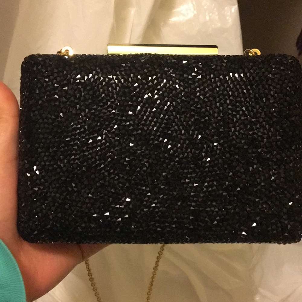 New INC black & gold clutch with removable strap